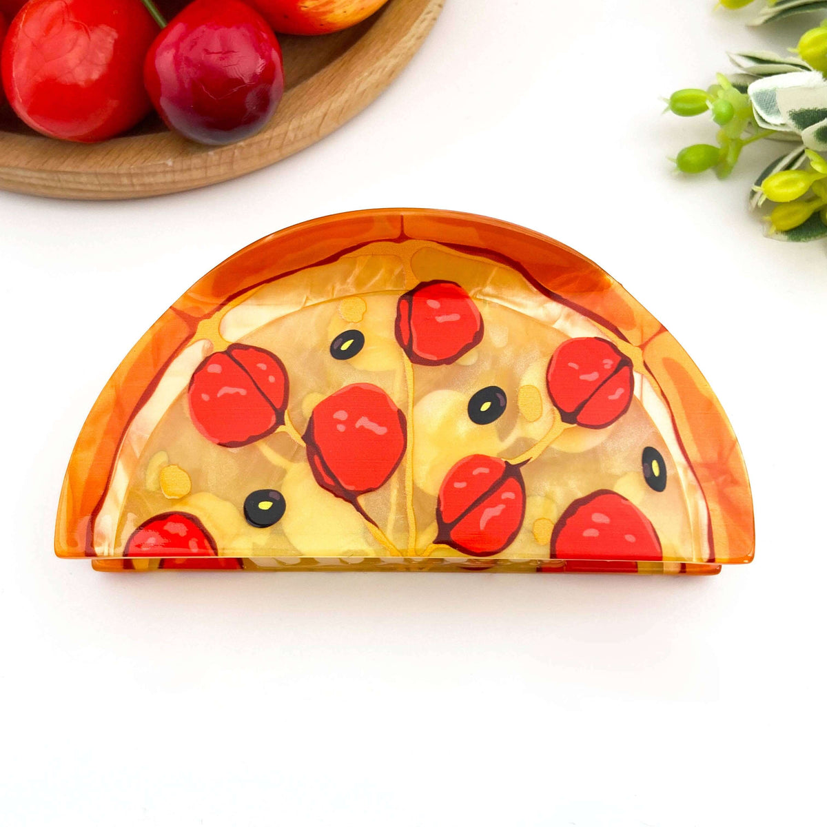 Pizza hair claw clip designed as a ham pizza slice with colorful toppings, perfect fun hair accessory.