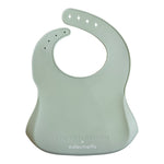 Silicone Baby Bib in soft green color, designed for kids, featuring a fun hashtag and comfortable neck opening.