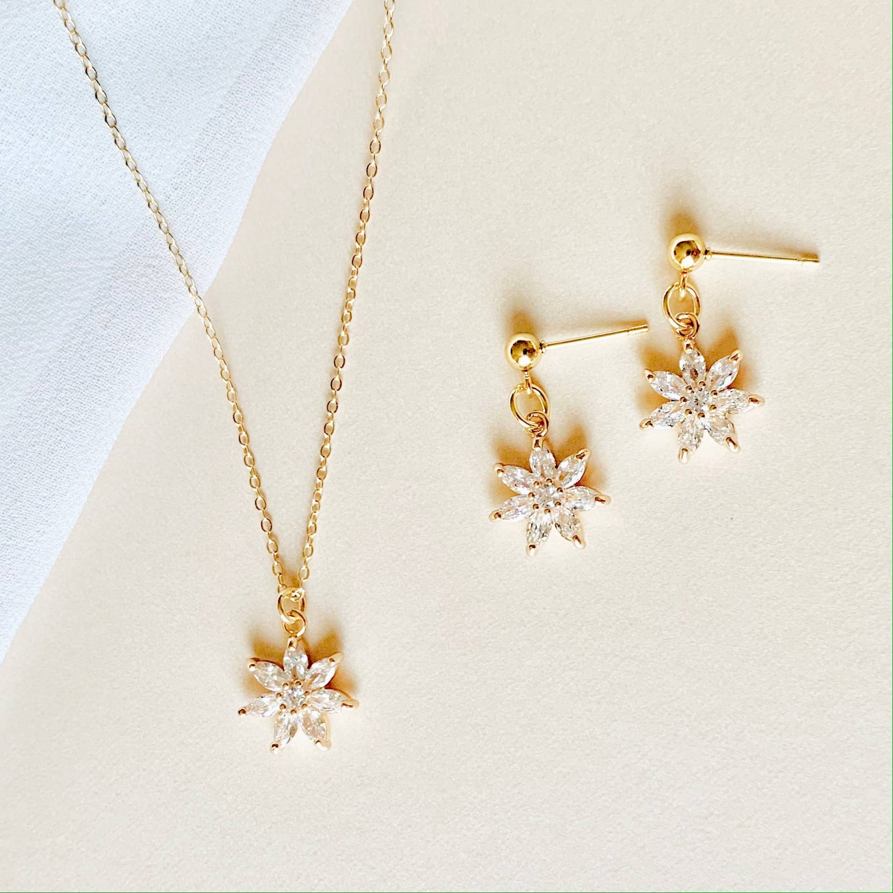 CRYSTAL FLOWER EARRINGS | gold | diamond flower earrings - Savedra James