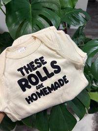 THESE ROLLS ARE HOMEADE BABY ONESIE