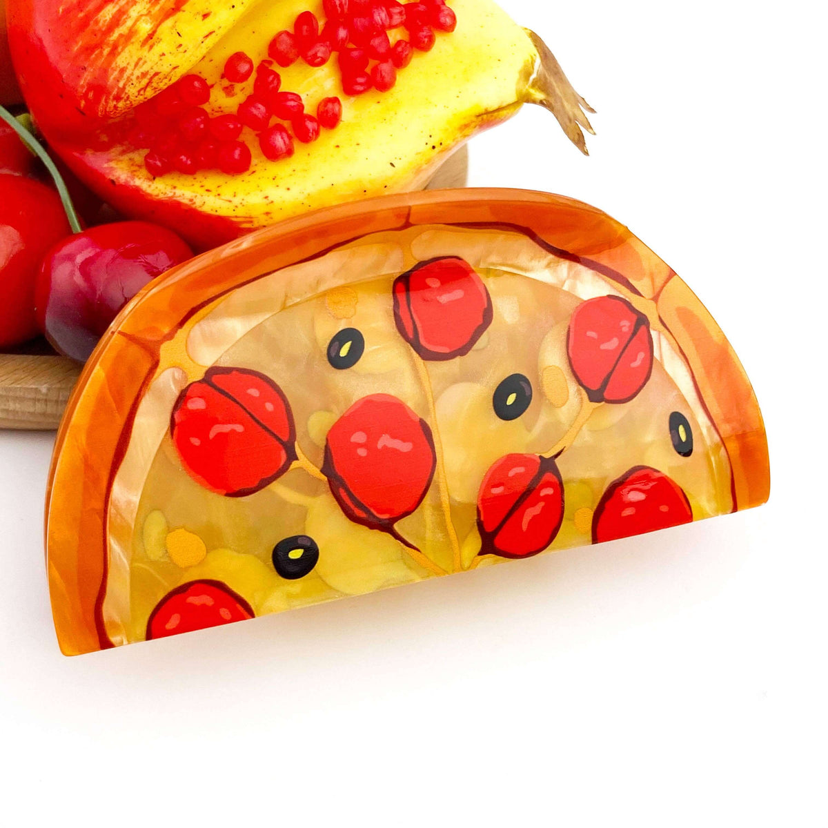 Pizza hair claw clip designed like a ham pizza slice with pepperoni, quirky hair accessory for playful style.