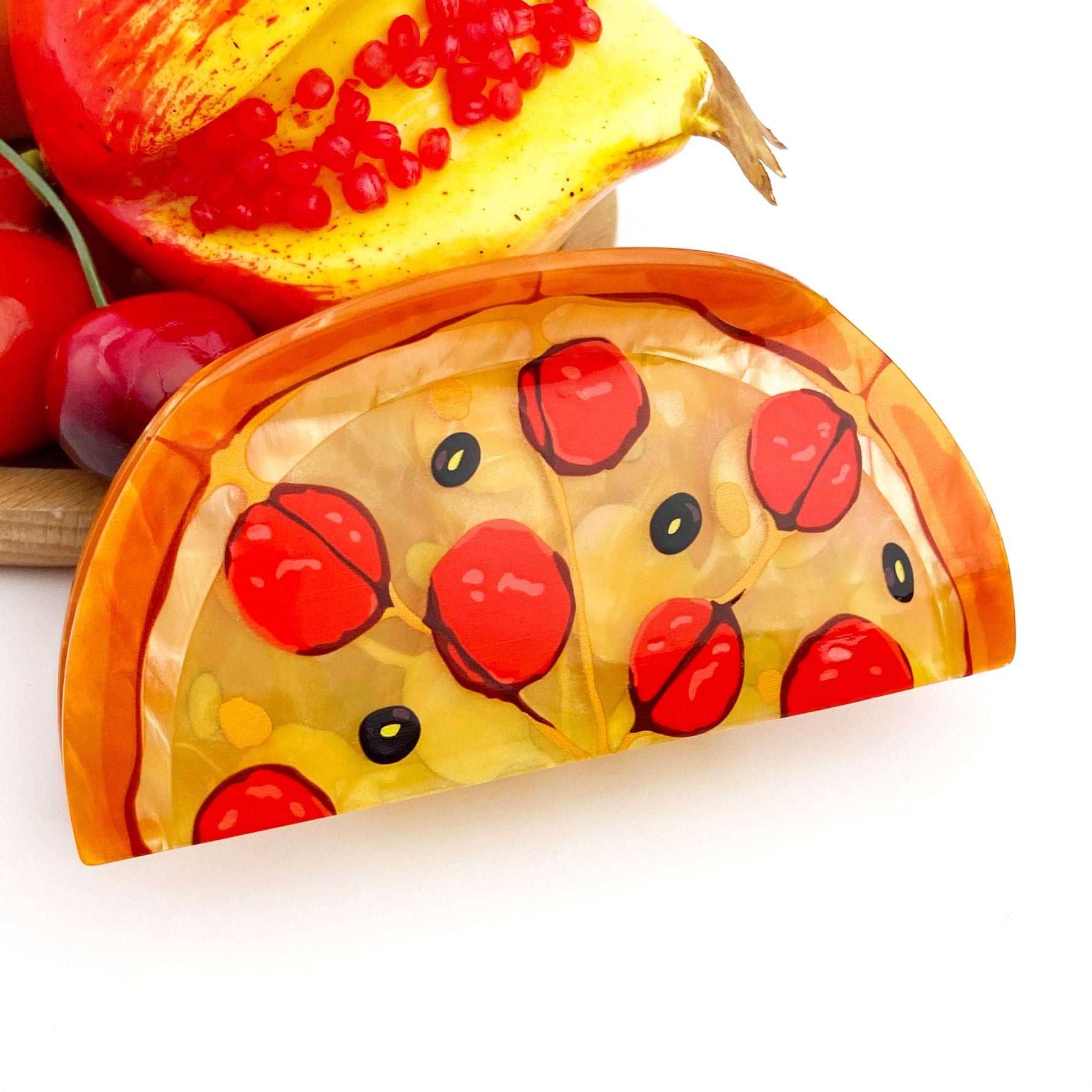 Pizza hair claw clip designed like a ham pizza slice with pepperoni, quirky hair accessory for playful style.