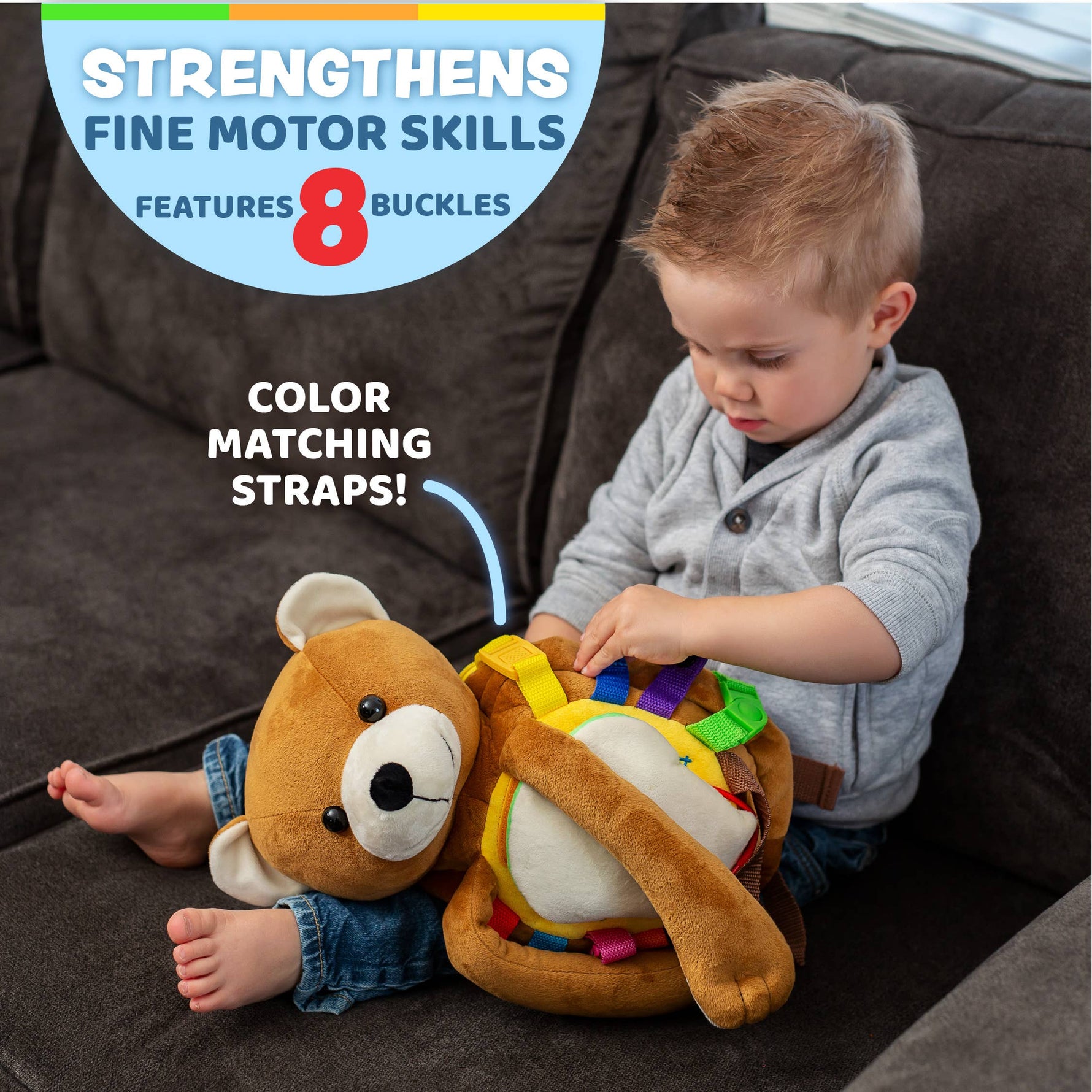 Baby sensory backpack: a child engaging with a plush bear backpack featuring 8 buckles and color matching straps.
